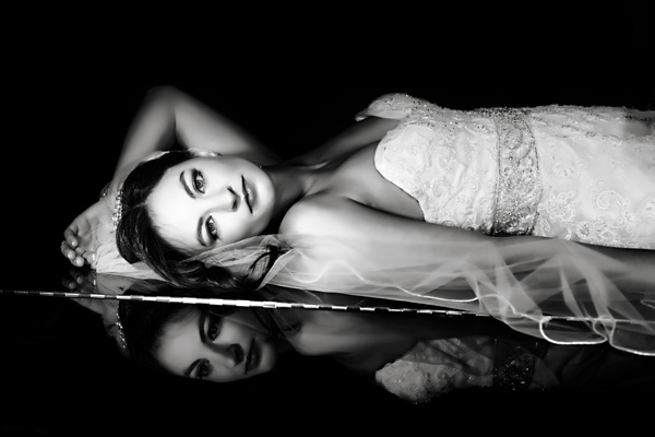 Gorgeous black and white portrait of bride using reflections, wedding photo by A Truth be Shown
